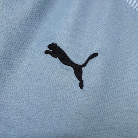 Camisa Manchester City I 25/26 - Torcedor Puma Masculina - Azul faixa Branca